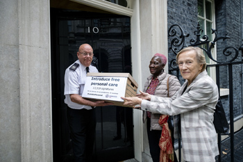A petition calling on the government to introduce free personal care for older people, signed by more than 13,000 people in just over two weeks, has been presented to the Prime Minister.